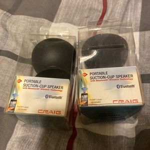 Portable speaker with suction cup
